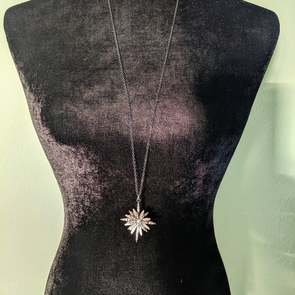 Sparkly pendant with black chain
